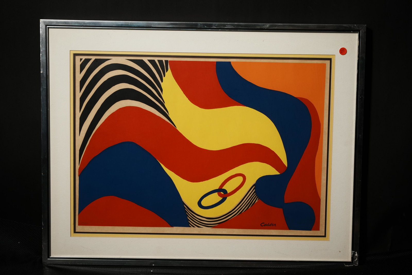 Alexander Calder framed art: Alexander Calder framed art printed lithograph. Back side has a COA. Estate of Orange. H: 33" x W: 25.25." Numbered 124 out of 375.