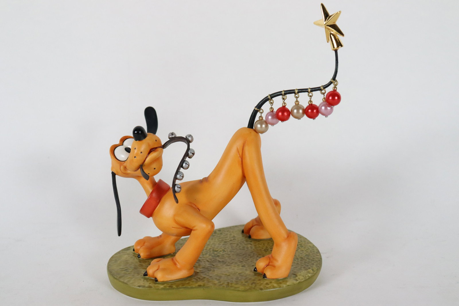 Pluto WDC fine figurine (1 of 7)