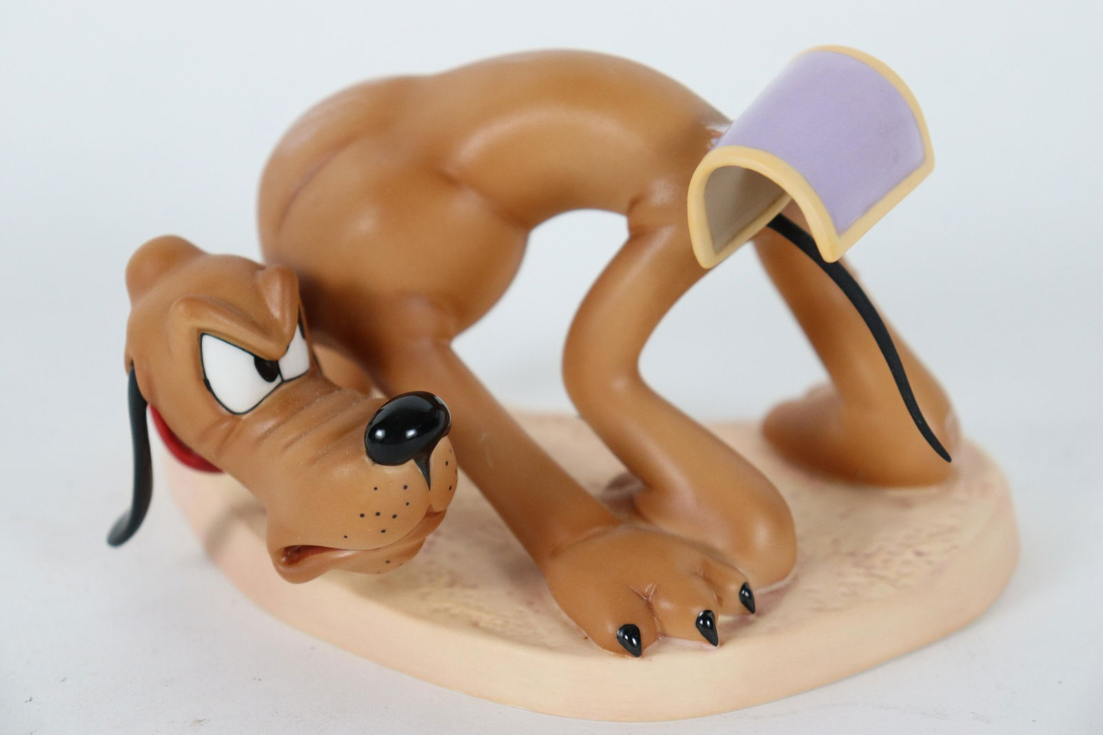 Pluto WDC fine figurine (1 of 7)