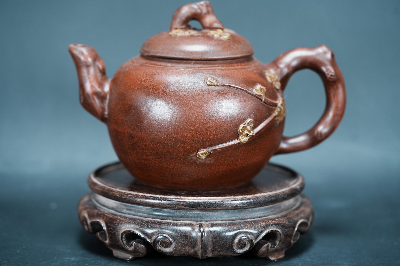 Chinese carved clay tepaot: Chinese vintage carved clay teapot. H: 4.25" x W: 6."