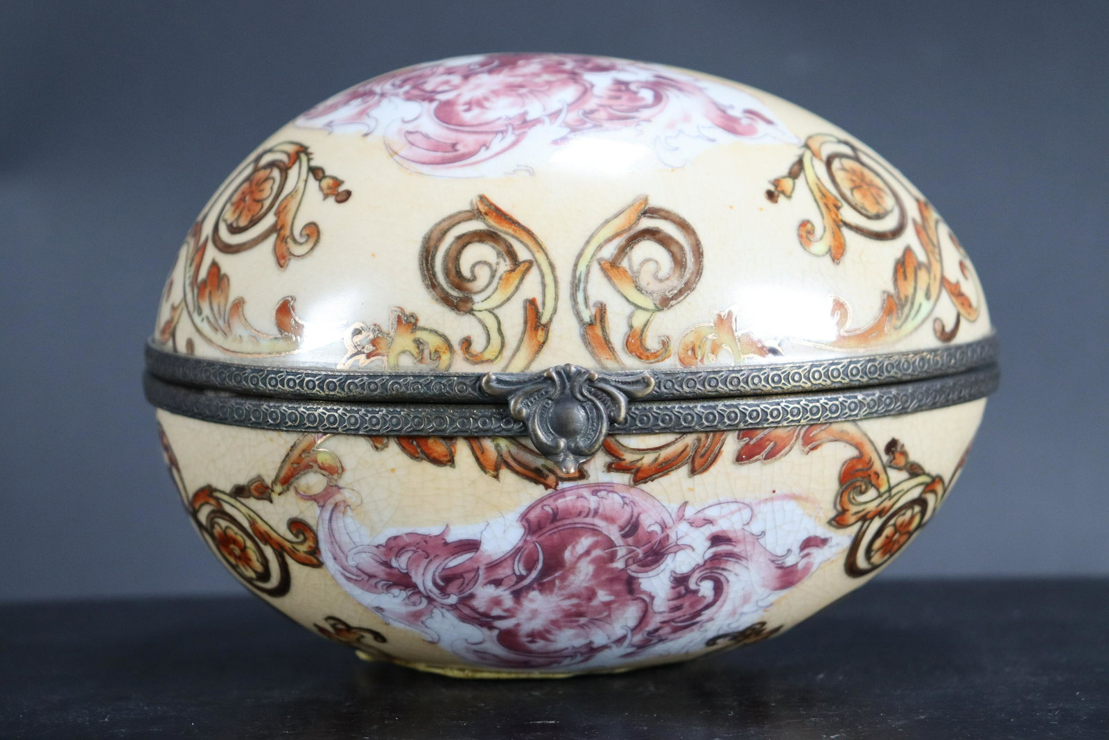 Porcelain egg box: A vintage painted porcelain egg box. H: 4.5" x W: 6.25."