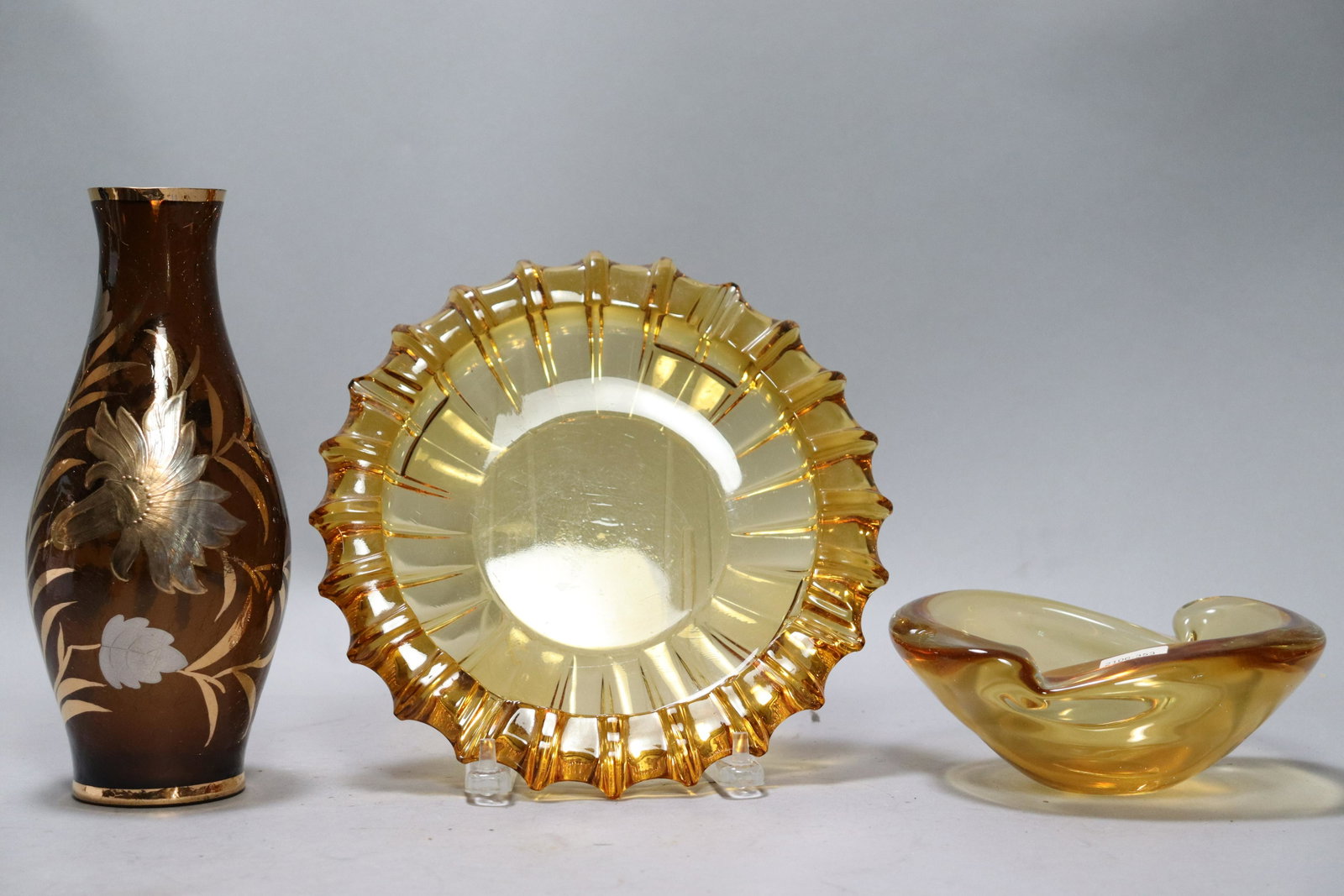 3 pcs vintage items: 3 pcs vintage items, some are crystals. One of the vase has some cracks, condition selling it as is. Largest H: 10.25" x W: 4.25."