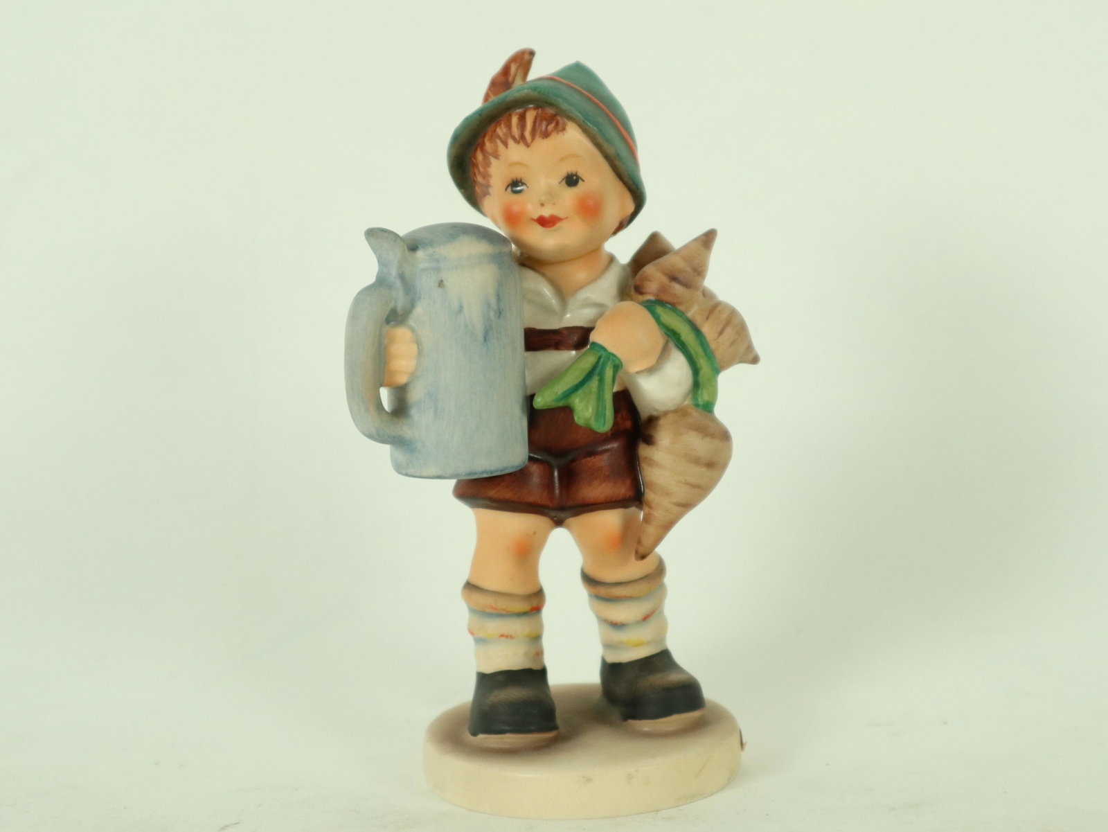 Vintage Hummel figurine: A vintage Hummel figurine, W. Germany. H: 5.5" x W: 2.5."