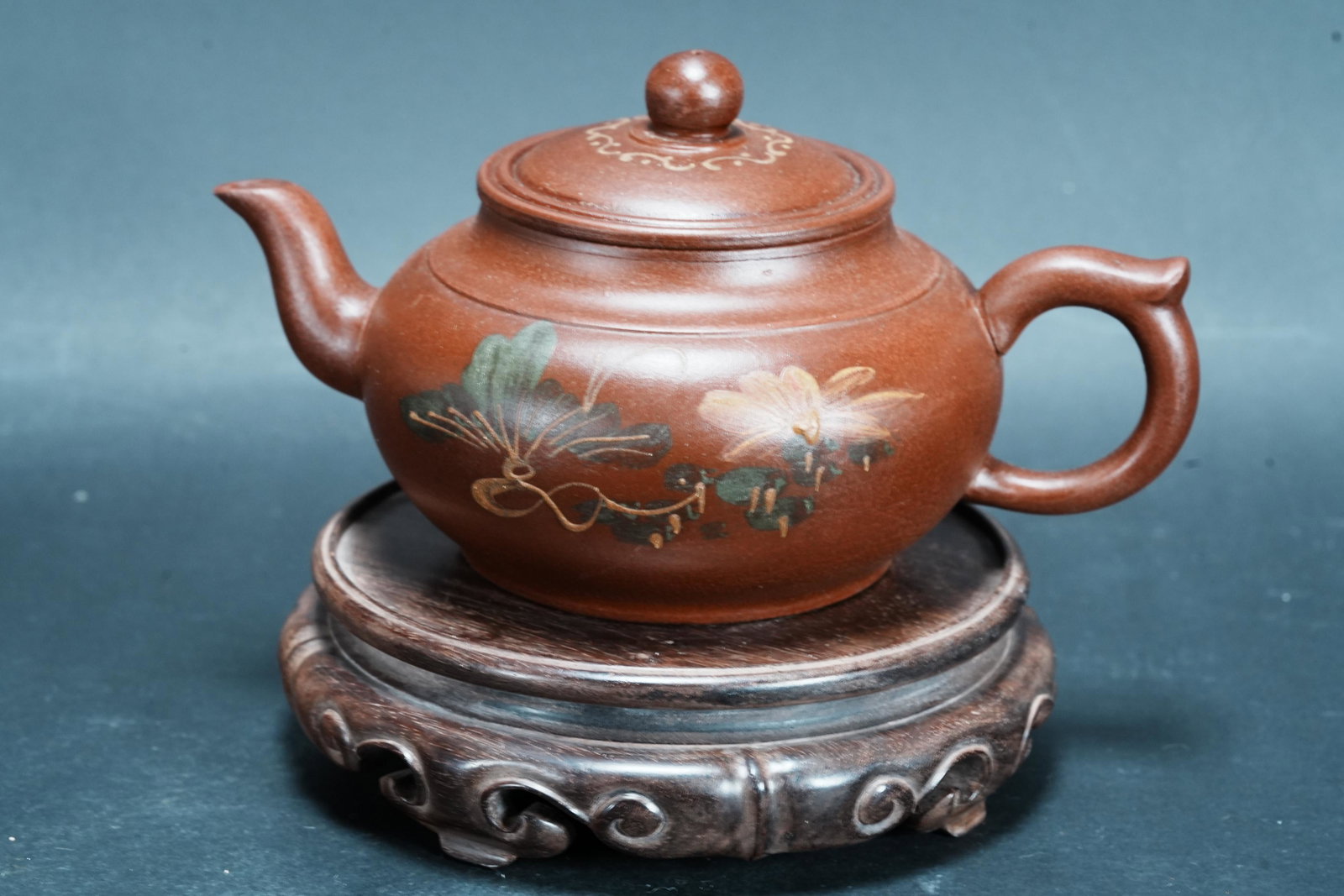 Chinese clay teapot: Chinese vintage fine clay teapot. H: 3.5" x W: 6.75."