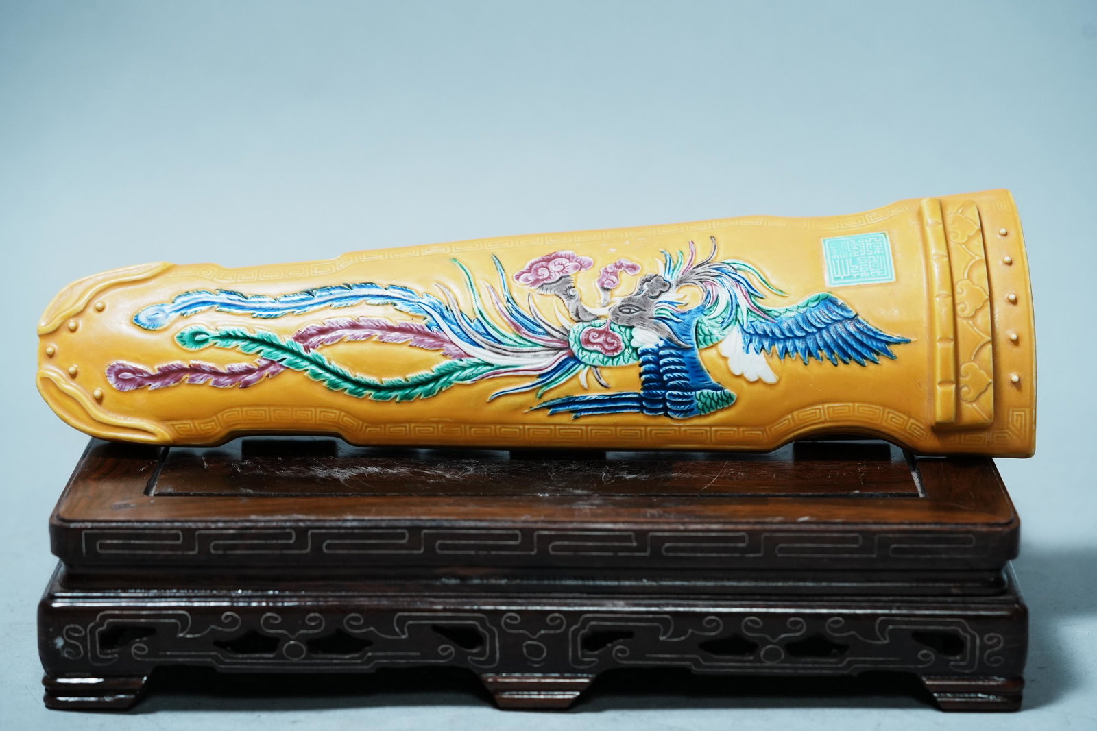 Chinese porcelain instrument: Chinese yellow glaze porcelain musical instrument. H: 1.75" x W: 11.25."