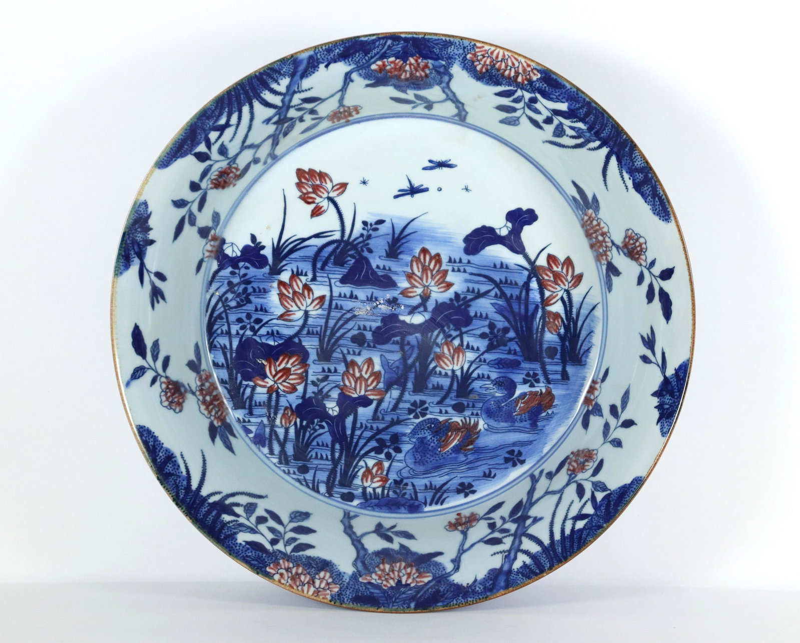 Chinese b/w charger plate: Chinese blue and white charger plate. H: 4" x W: 17."