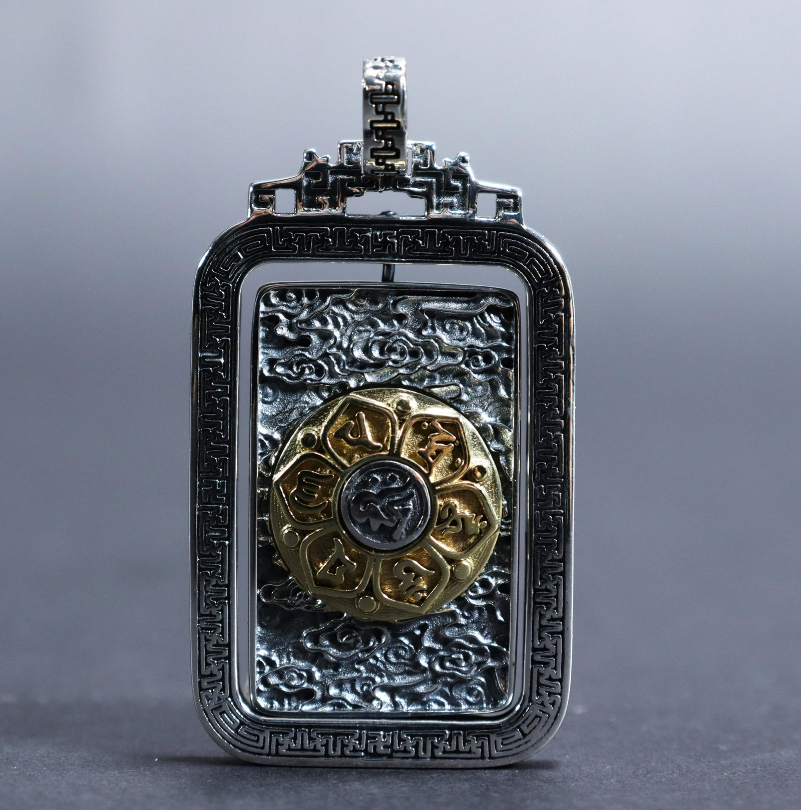 Tibetan sterling silver pendant: Tibetan fine sterling silver pendant. H: 2.15" x W: 1.15."