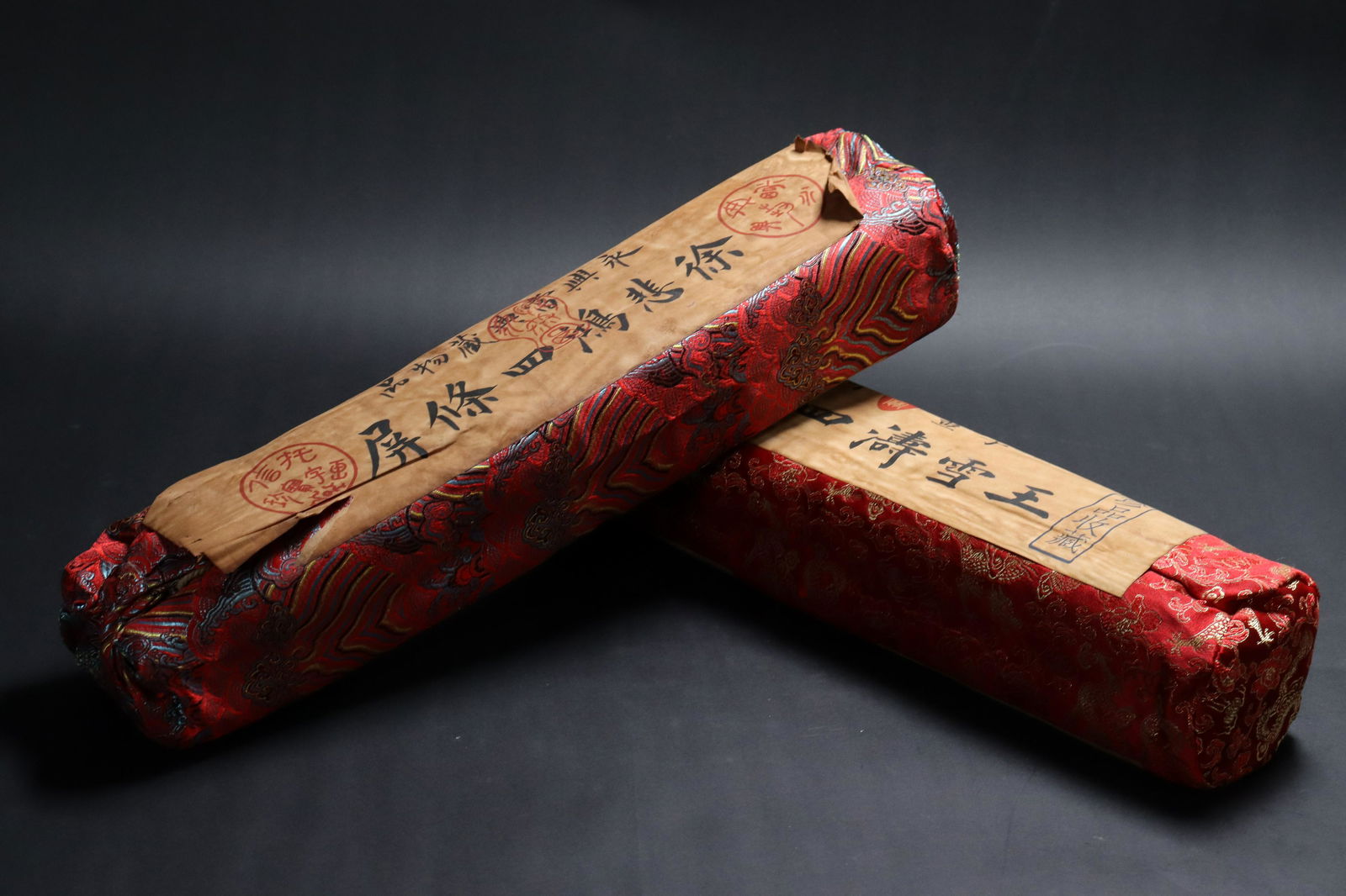 Lots of Chinese scrolls: Lots of Chinese scrolls, wrapped in cloth.