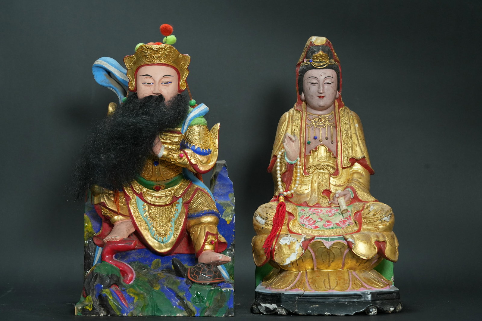 2 pcs Chinese camphor wood statue: 2 pcs Chinese vintage large size camphor wood carved deities. Condition selling it as is. Estate of a major temple. H: 16.25" x W: 8."