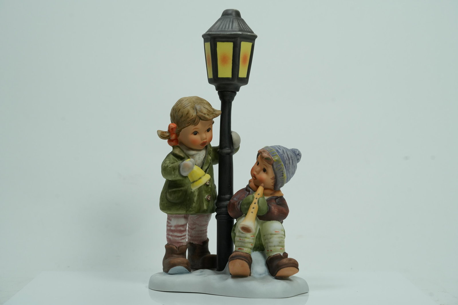 A large Goebel figurine: A large Goebel figurine. H: 8.5" x W: 4.75."