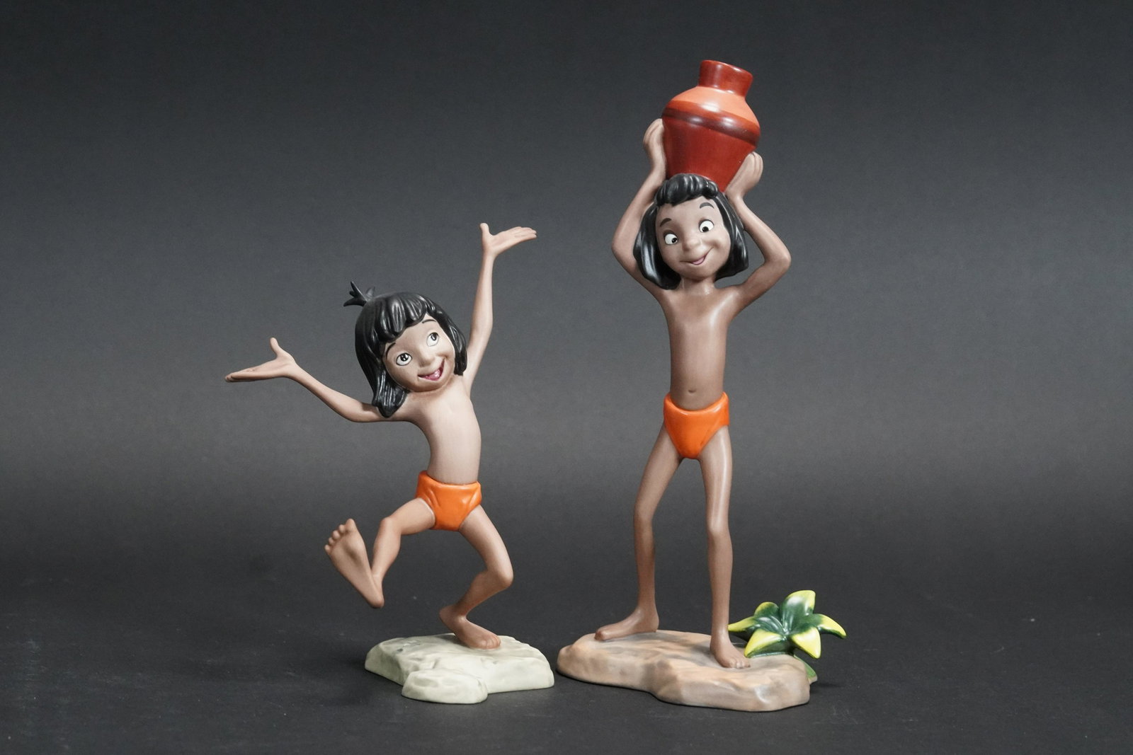 2 pcs WDC fine figurines: 2 pcs WDC fine figurines, The Jungle Book. Both comes with original box. Largest H: 6.6" x W: 3.8."
