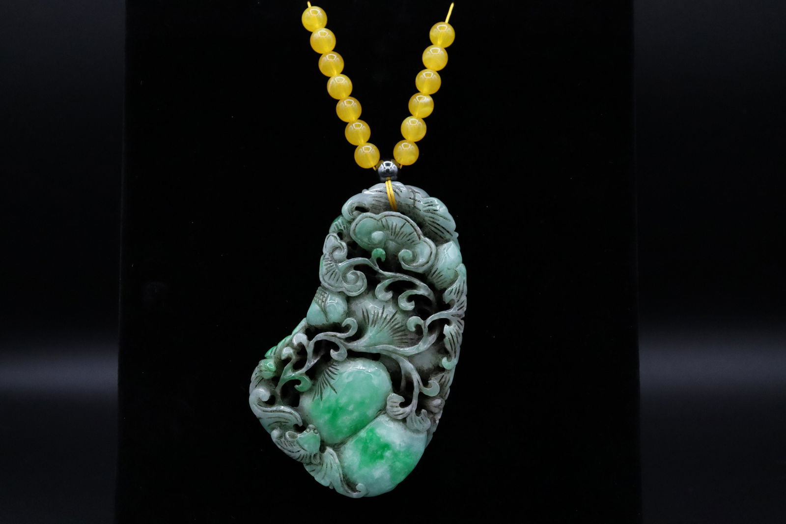 Chinese fine jadeite pendant: Chinese fine large jadeite carved pendant. L: 20.5."