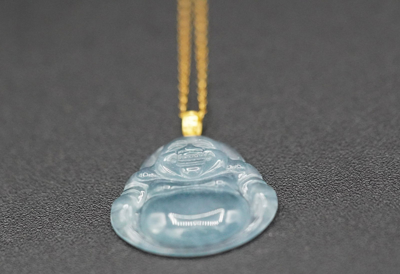 Chinese 18 KT jadeite pendant: Chinese 18 KT jadeite pendant.Necklace itself is not gold.