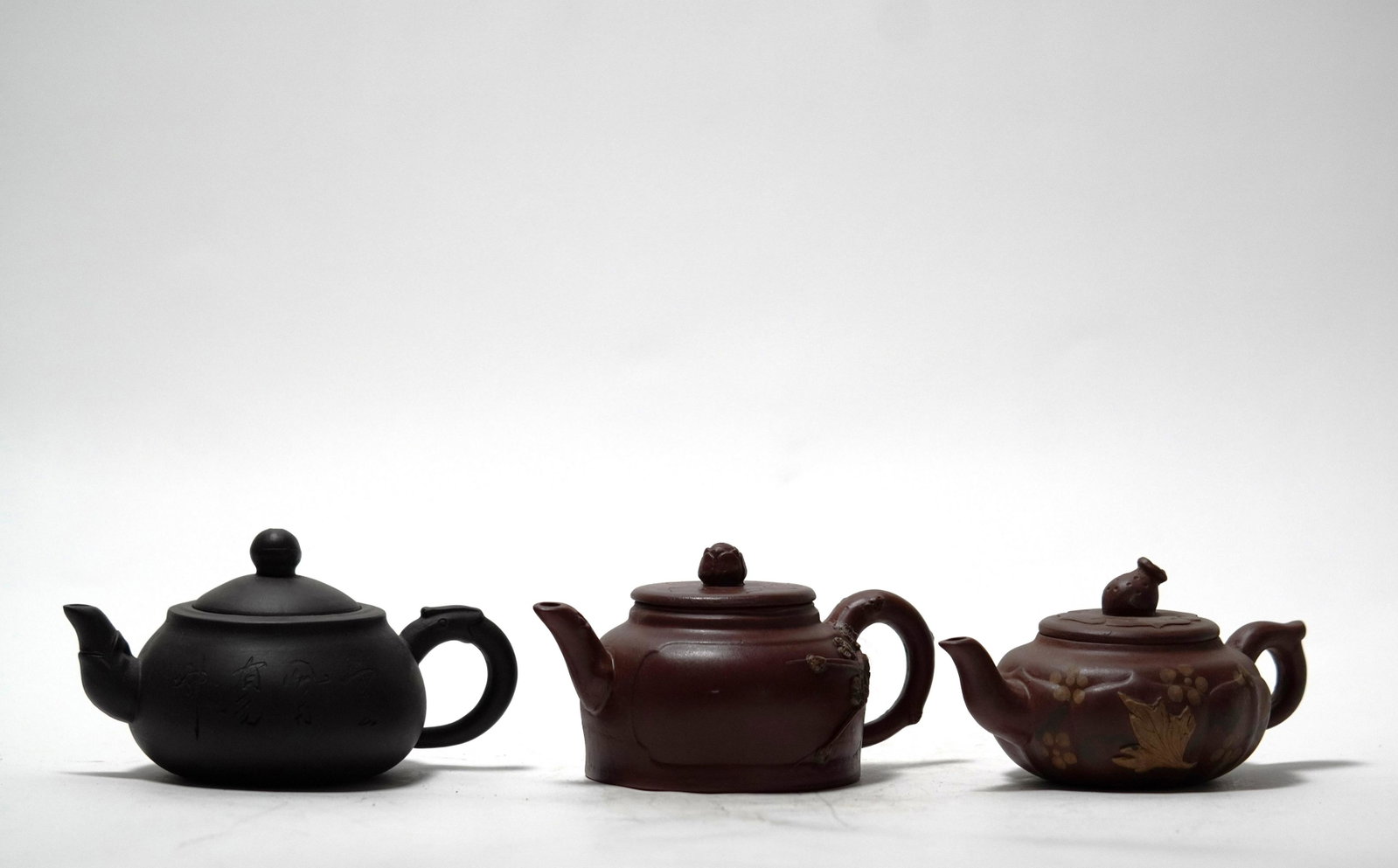 3 pcs Chinese clay teapot: 3 pcs Chinese fine clay teapot. H: 3" x W: 6.5."