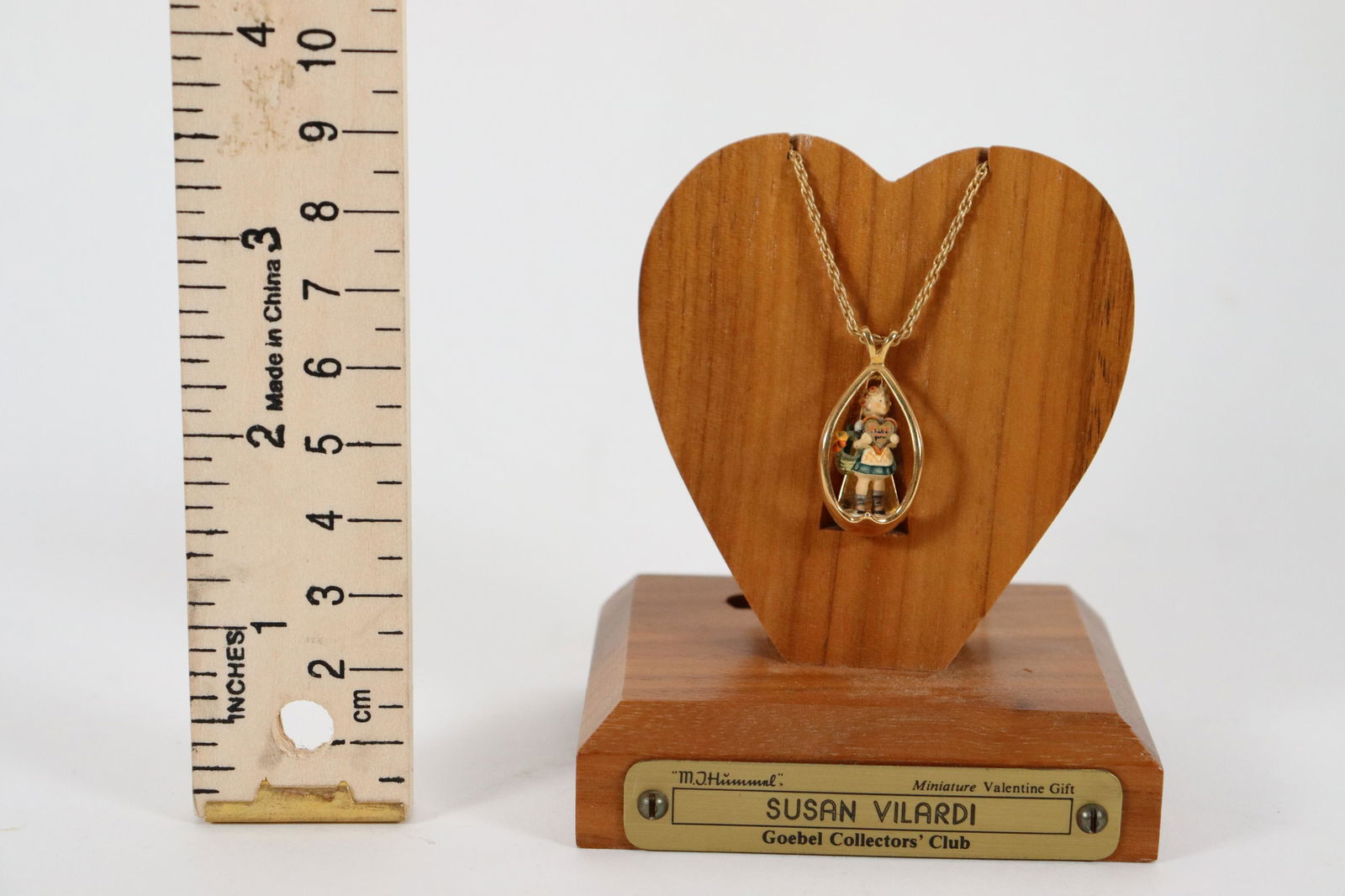 Goebel Hummel original necklace: Goebel Hummel vintage original necklace, with original collector's necklace stand.