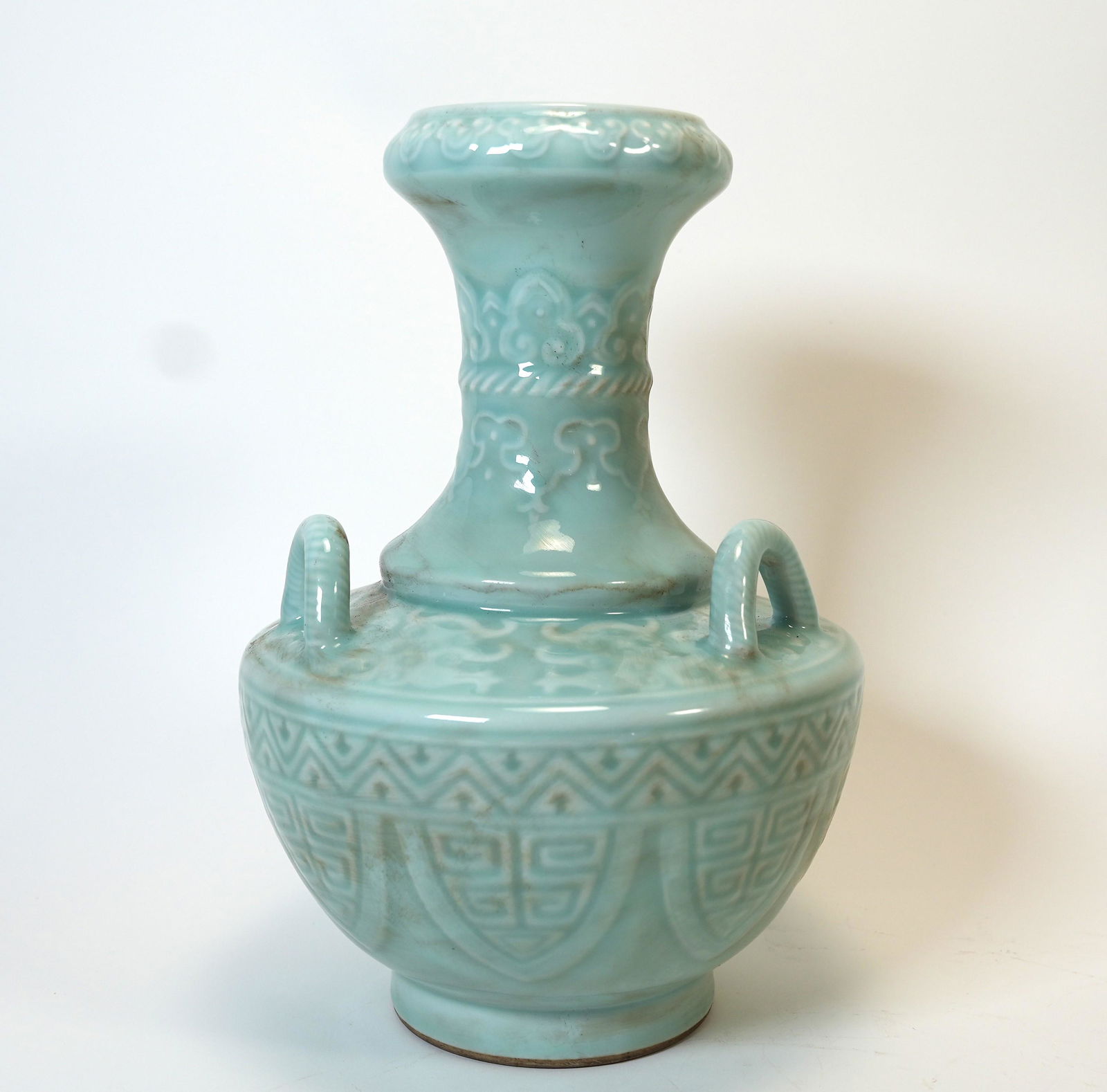 Chinese fine celadon vase: Chinese fine celadon glaze porcelain vase. H: 13" x W: 9."