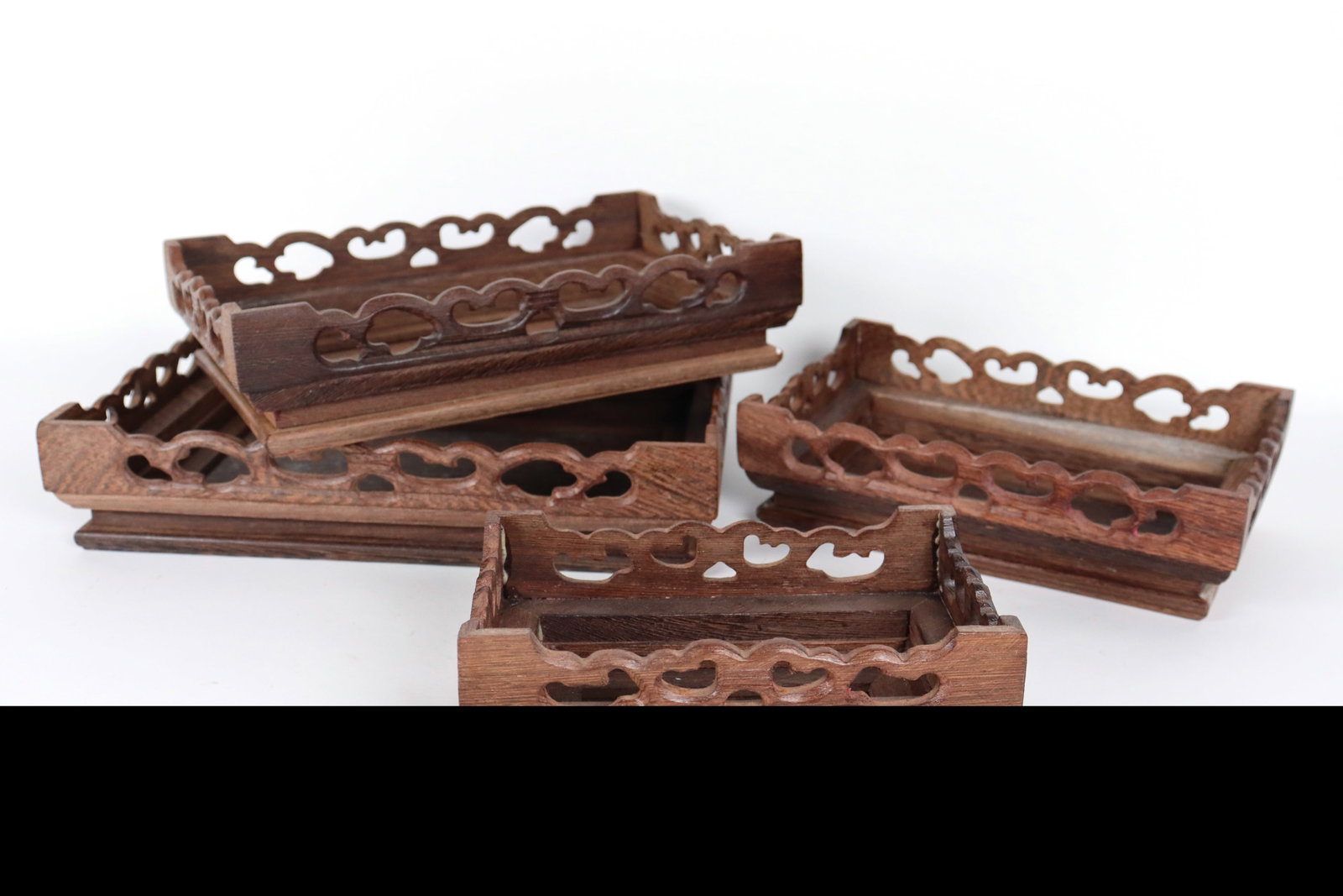 Lots of Chinese wood stands: Lots of Chinese wood stands. Largest H: 2.25" x W: 10."