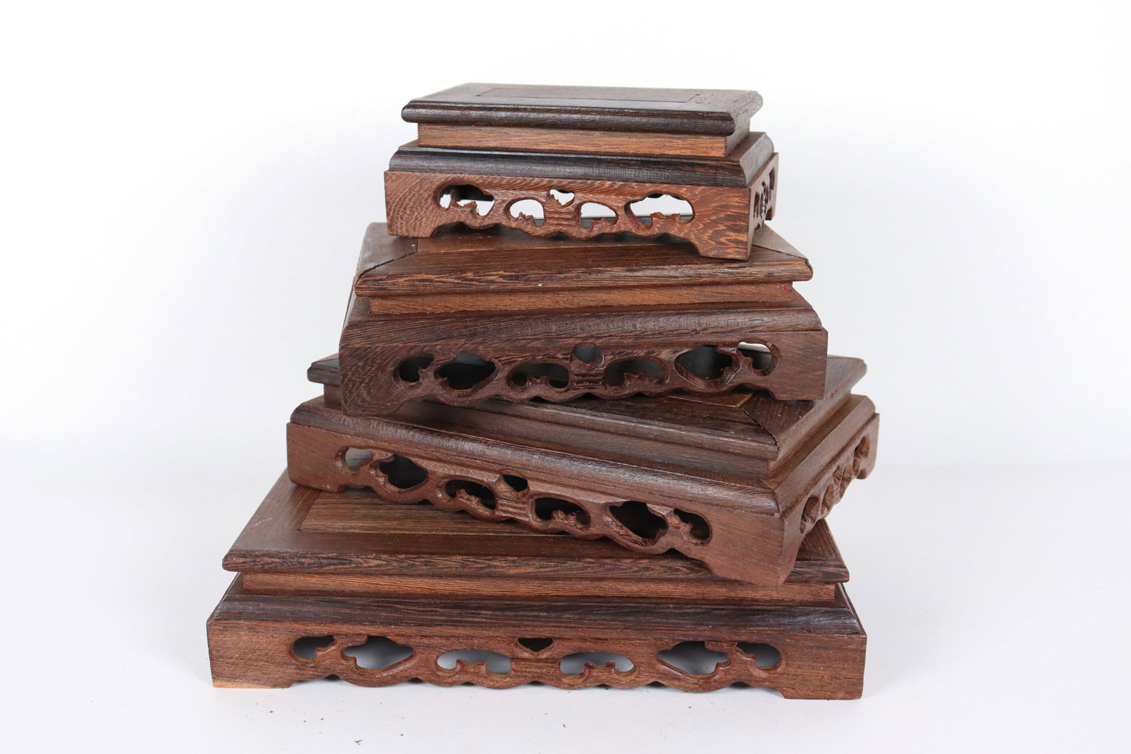 Lots of Chinese wood stands: Lots of Chinese wood stands. Largest H: 2.25" x W: 9.95."