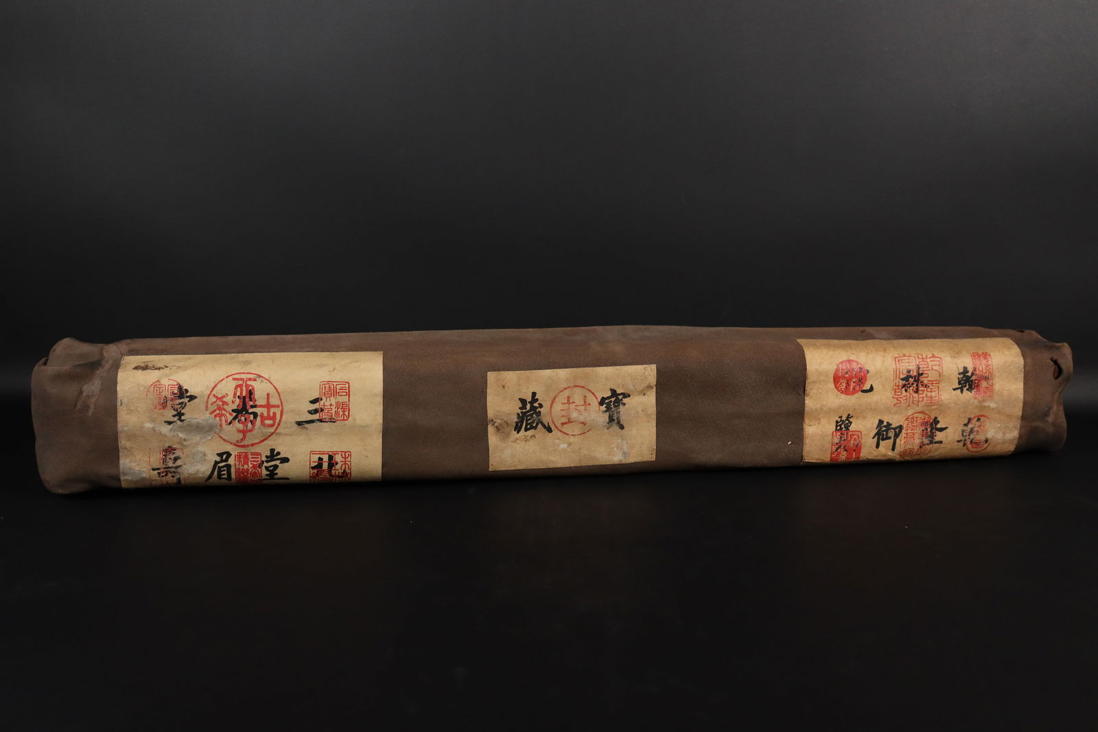 Lots of Chinese scrolls: Lots of Chinese scrolls, wrapped and sealed.