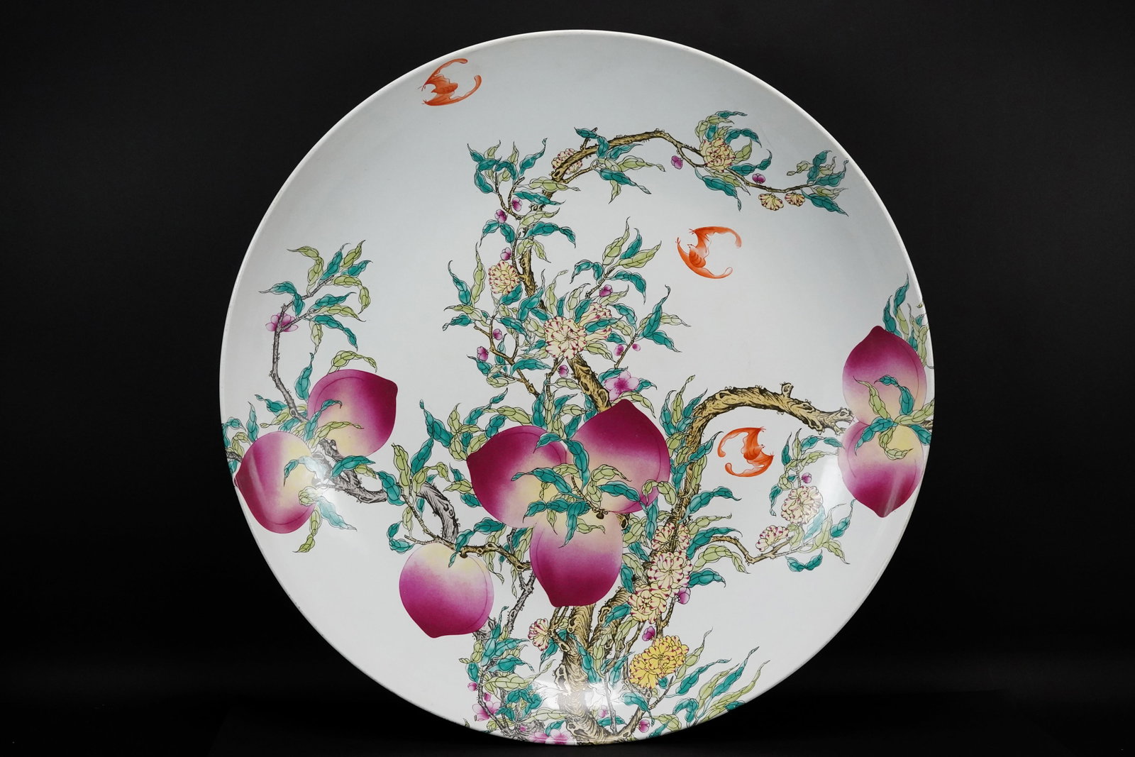 Chinese peach fine charger: Chinese fine peach glaze charger plate. H: 4.1" x W: 22."