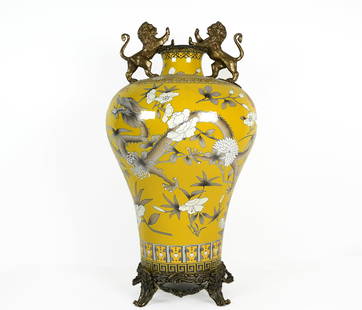 Chinese bronze yellow vase: Chinese bronze carved yellow heav y vase. H: 19" x W: 10."