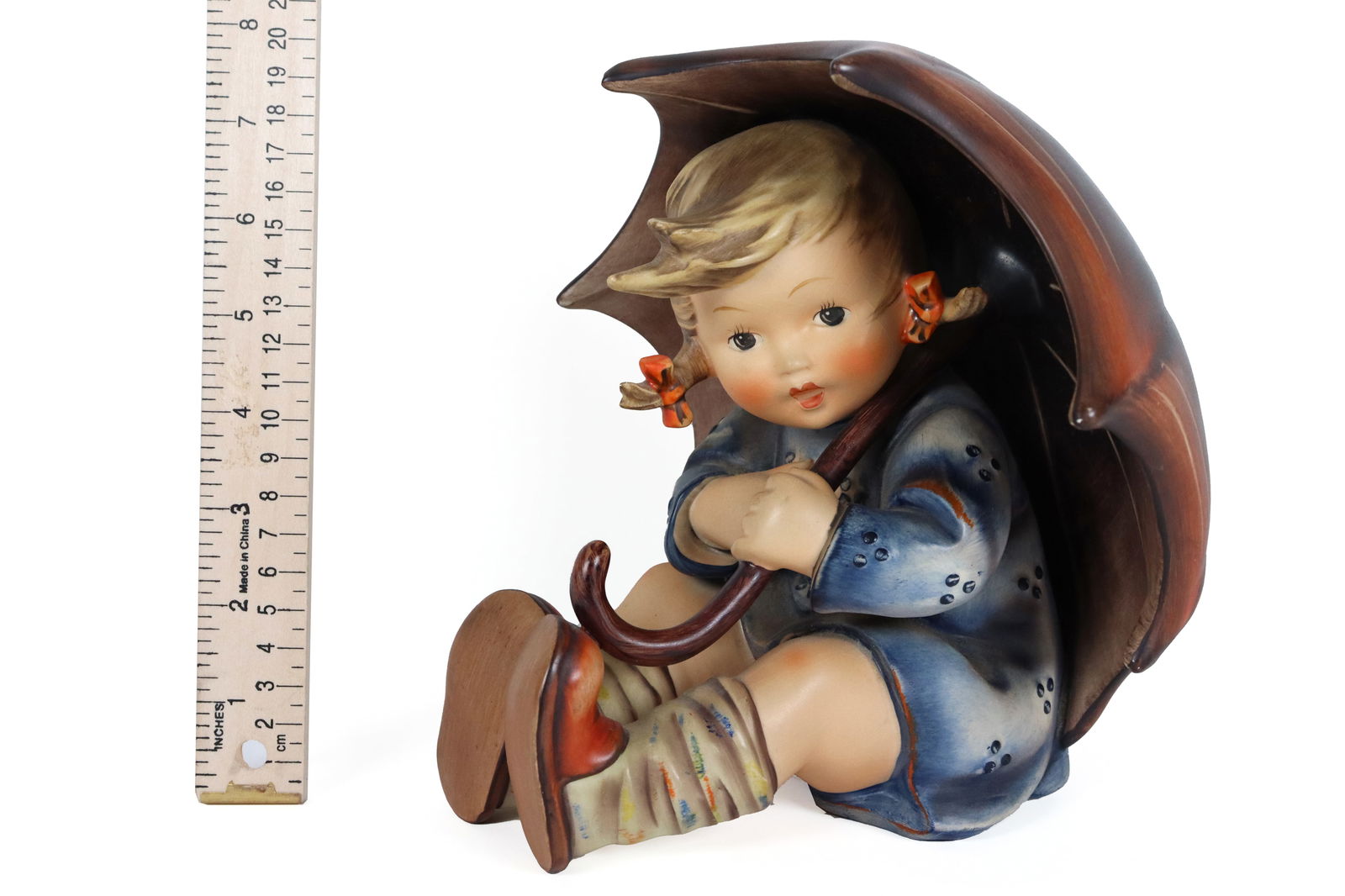 Large Goebel Hummel figure: Large Goebel Hummel fine umbrella girl figure.