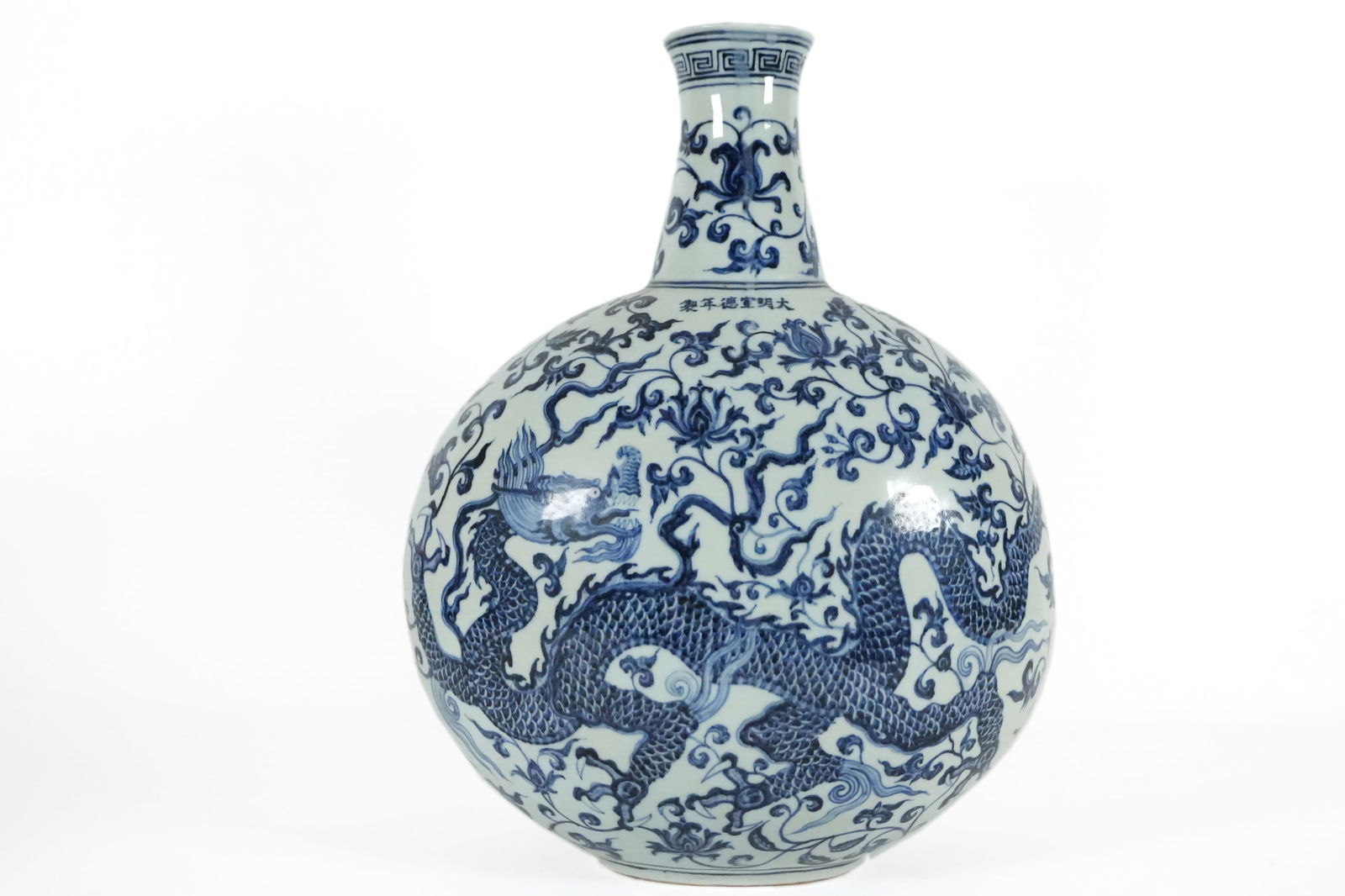 Chinese important b/w flask: Chinese vintage important fine blue and white dragon flask. H: 17.5" x W: 14."
