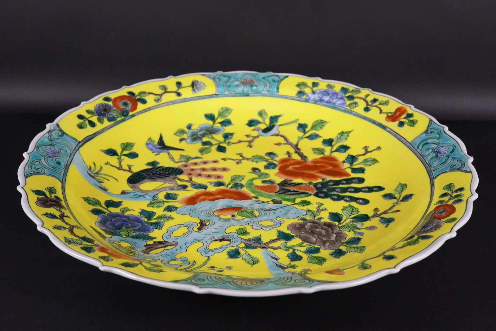 Chinese yellow charger plate: Chinese fine yellow charger plate. H: 2.75" x w: 17.6."