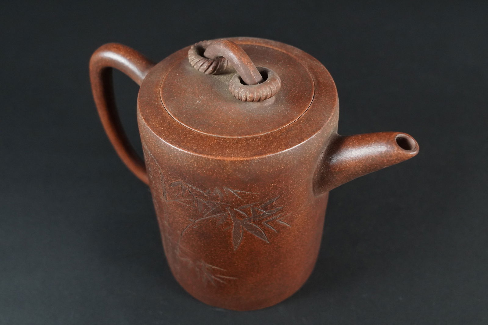 Chinese carved clay teapot: Chinese carved clay teapot. Estate of Japanese collector. H: 6.25" x W: 8."