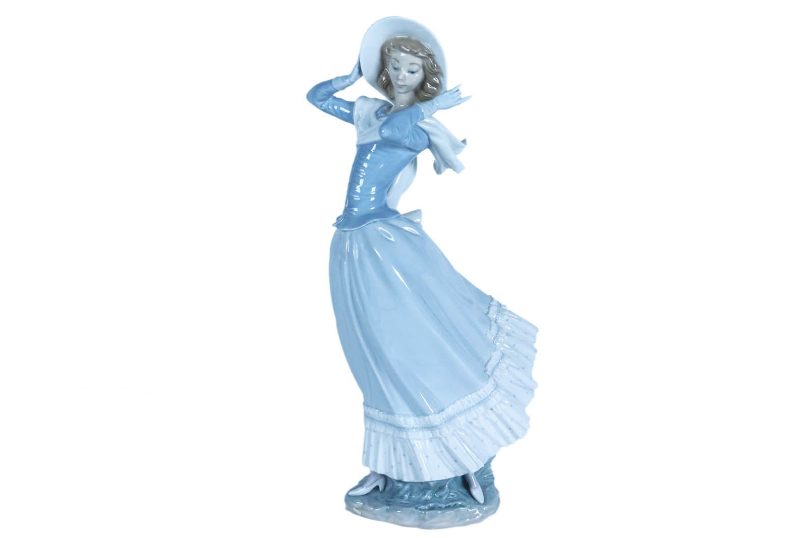 Lladro tall woman figurine: Lladro tall woman figurine. H: 14.5" x W: 4.5."