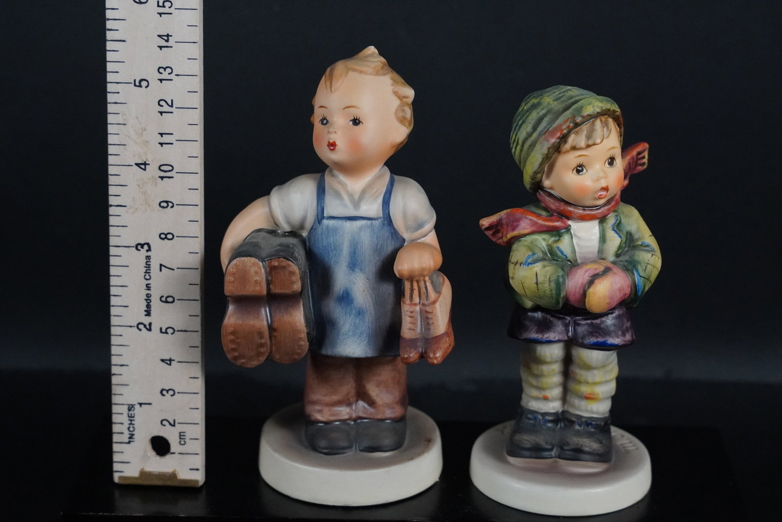 2 tall Hummel figurine: 2 vintage tall Hummel figurine.