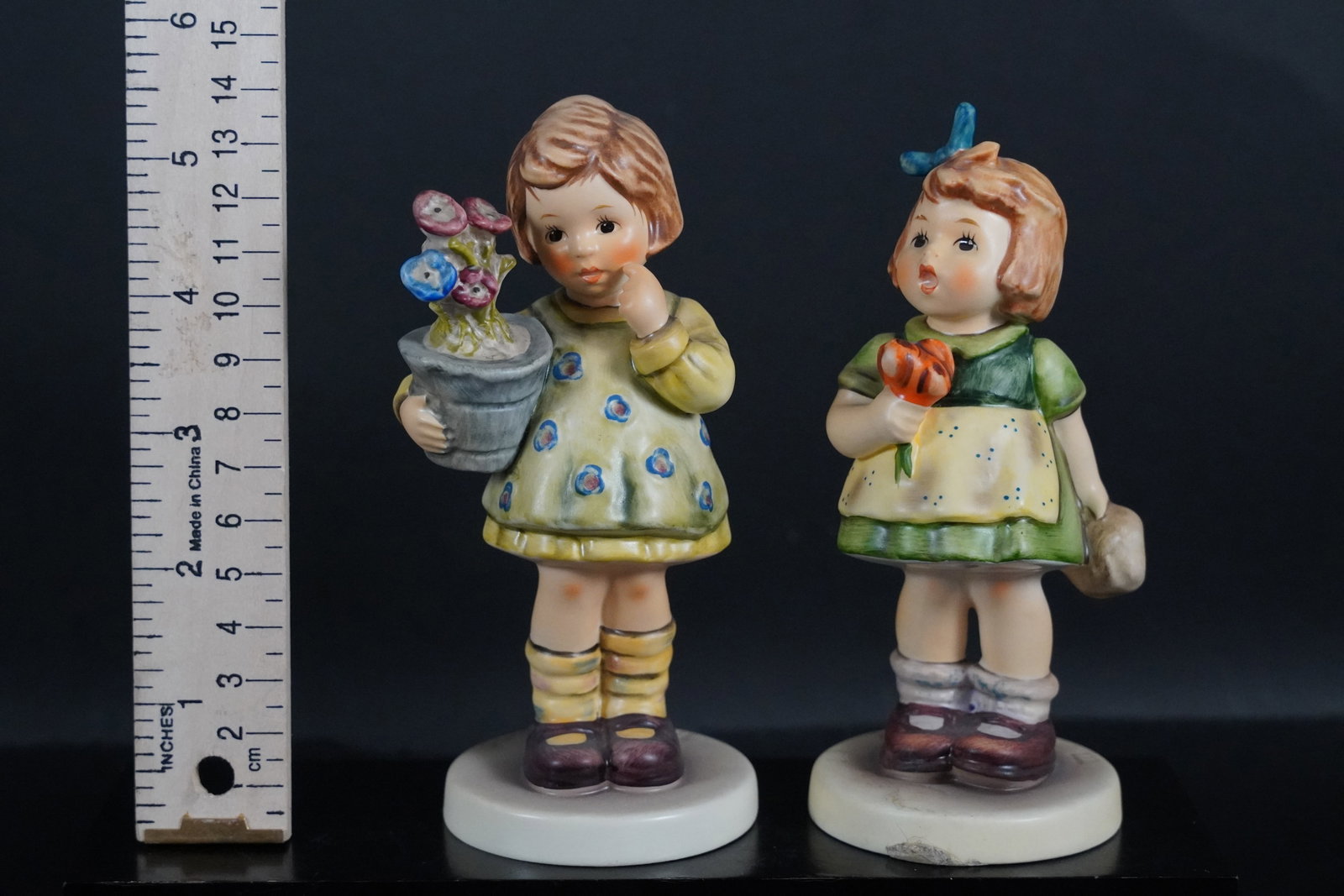 2 tall Hummel figurine: 2 vintage tall Hummel figurine.