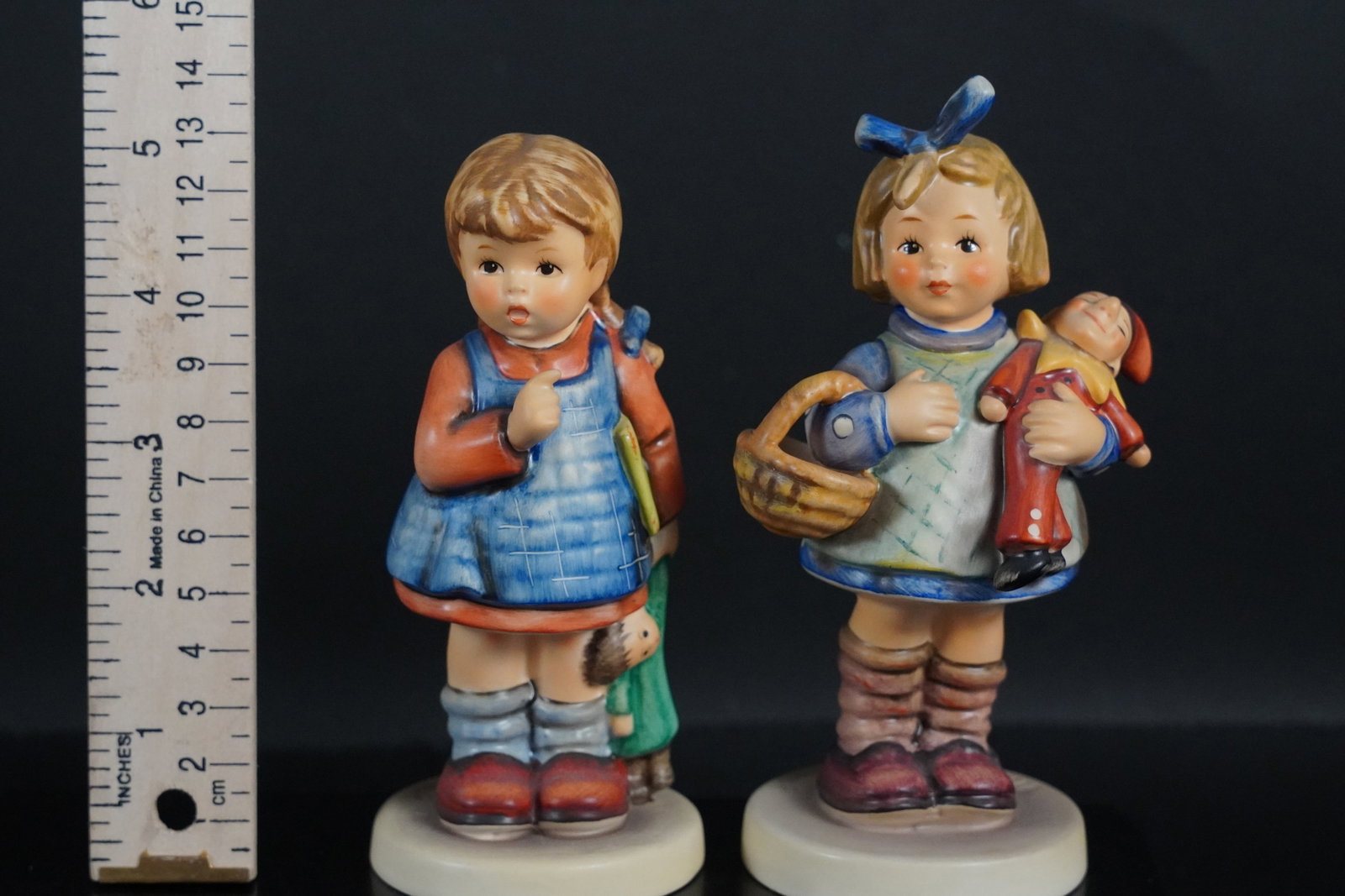 2 tall Hummel figurine: 2 vintage tall Hummel figurine.