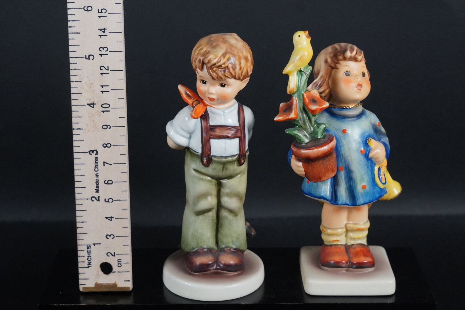 2 tall Hummel figurine: 2 vintage tall Hummel figurine.