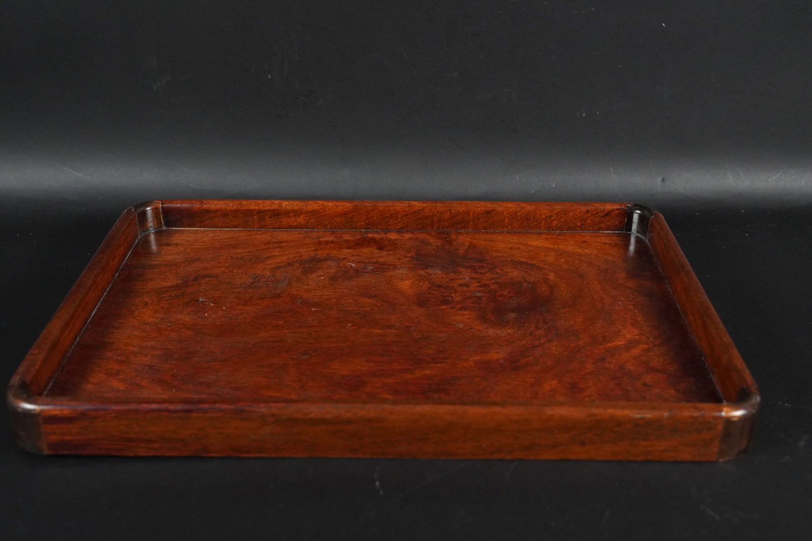 Chinese fine wooden tray: Chinese fine wooden tray. H: 1.2" x W: 13.9."