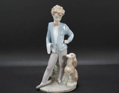 Lladro boy figurine: Lladro boy figurine. H: 8" x W: 8."