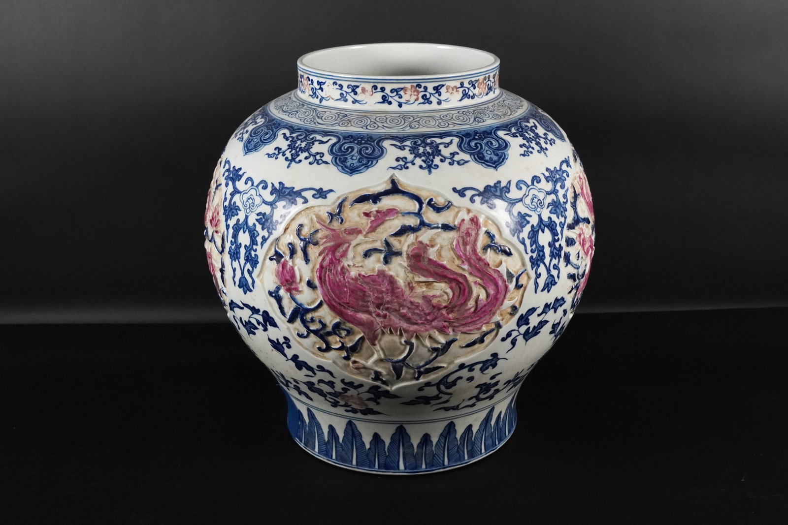 Chinese heavy carved jar: Chinese heavy carved jar. H: 13.75" x W: 13.75."