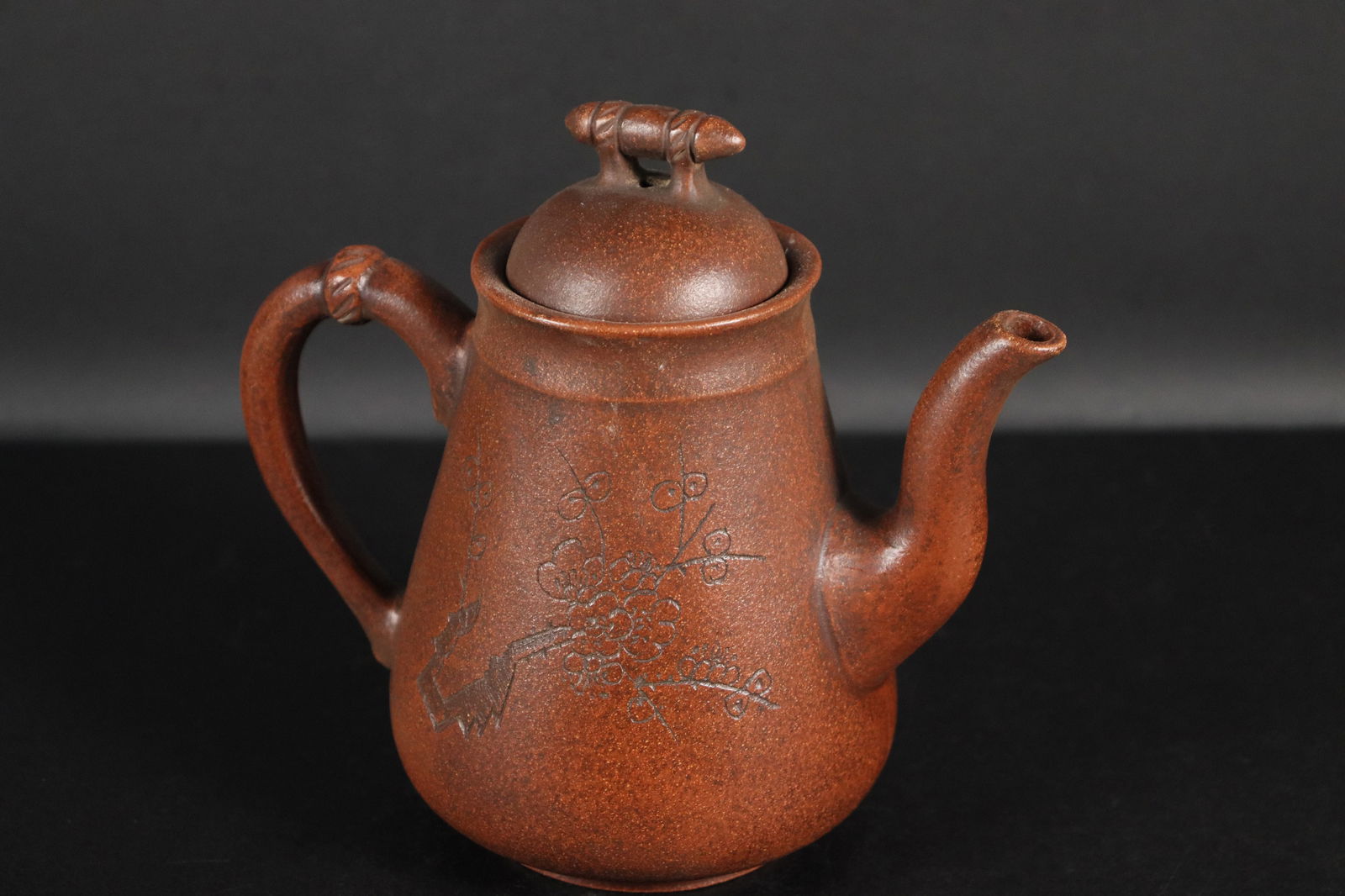 Chinese vintage clay teapot: Chinese vintage clay teapot. H: 5.8" x W: 6.5."
