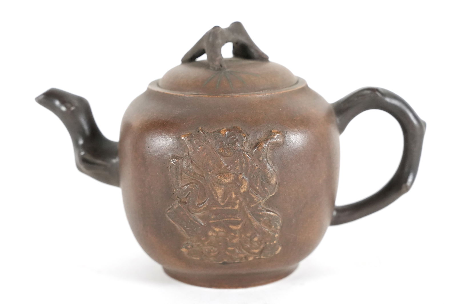 Chinese clay carved teapot: Chinese clay carved fine teapot. H: 5" x W: 7.7."
