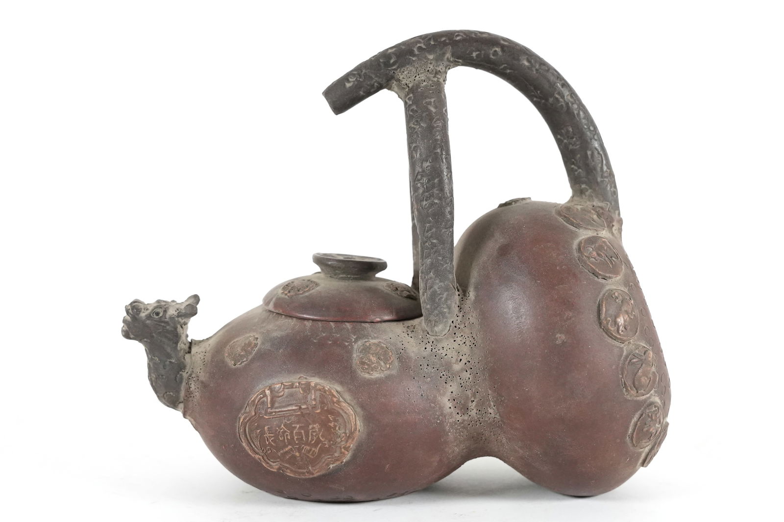 Chinese fine clay teapot: Chinese fine clay teapot. H: 8" x W: 9."