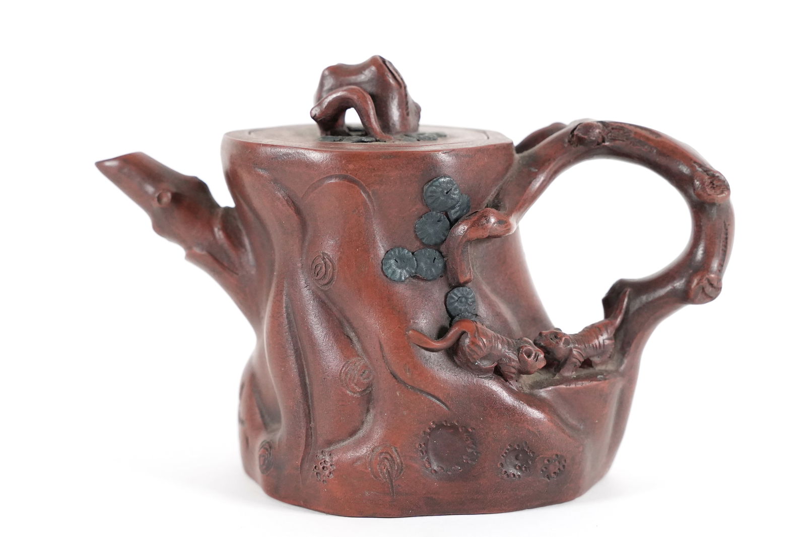 Chinese fine clay teapot: Chinese fine carved clay teapot. H: 4.5" x W: 6.5."