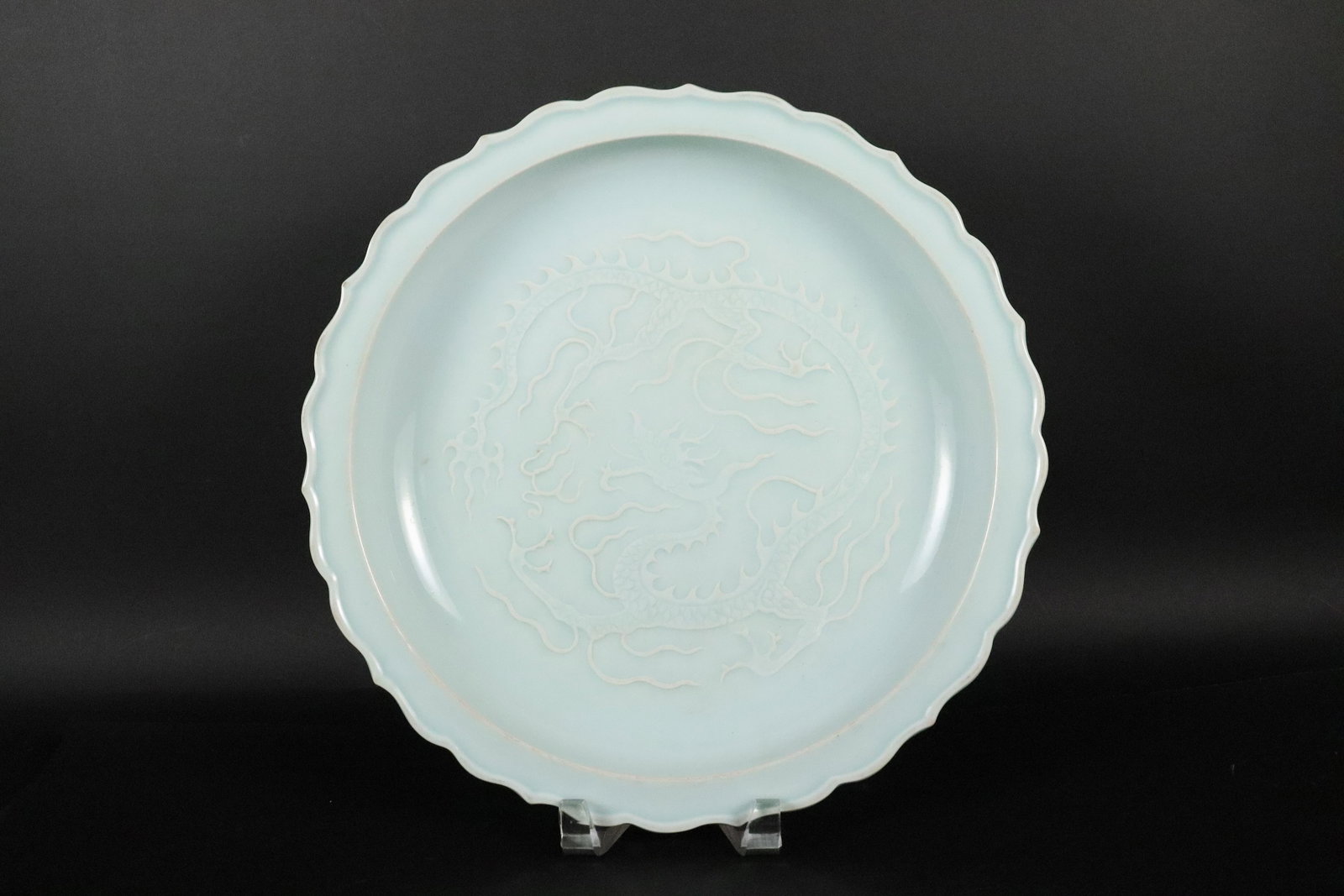 Chinese white dragon charger: Chinese white dragon glaze charger plate. H: 2.25" x W: 12.25."