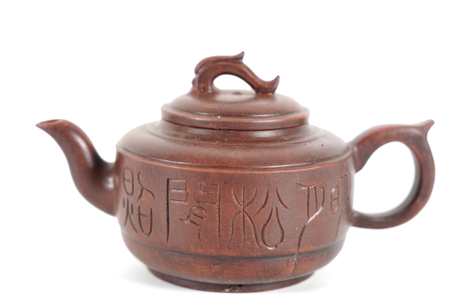 Chinese fine clay teapot: Chinese fine clay teapot. H: 4.1" x W: 7.6."