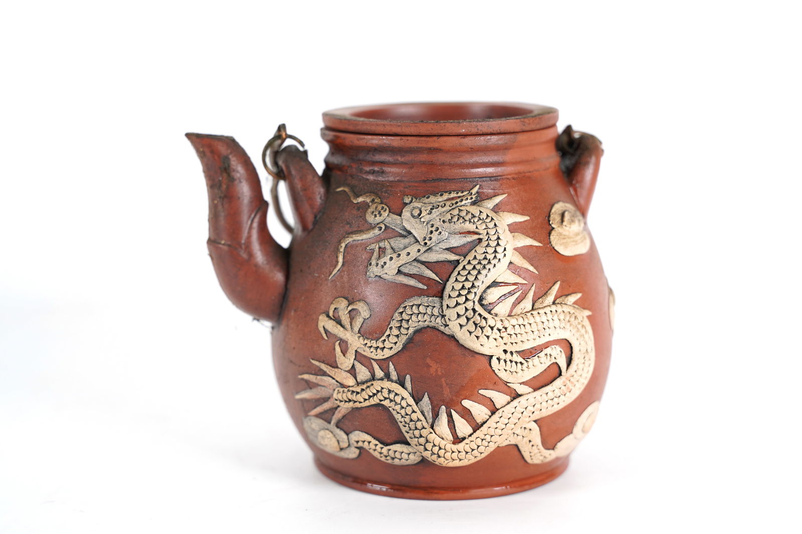 Chinese vintage clay teapot: Chinese vintage clay teapot. H: 5.1" x W: 5.75."