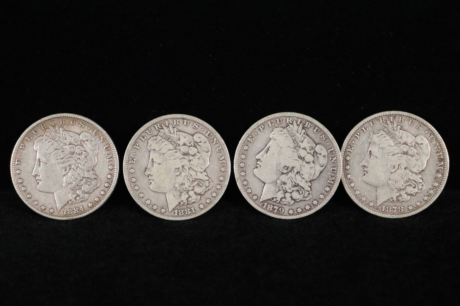 4 Morgan silver coins 1879 (1 of 4)