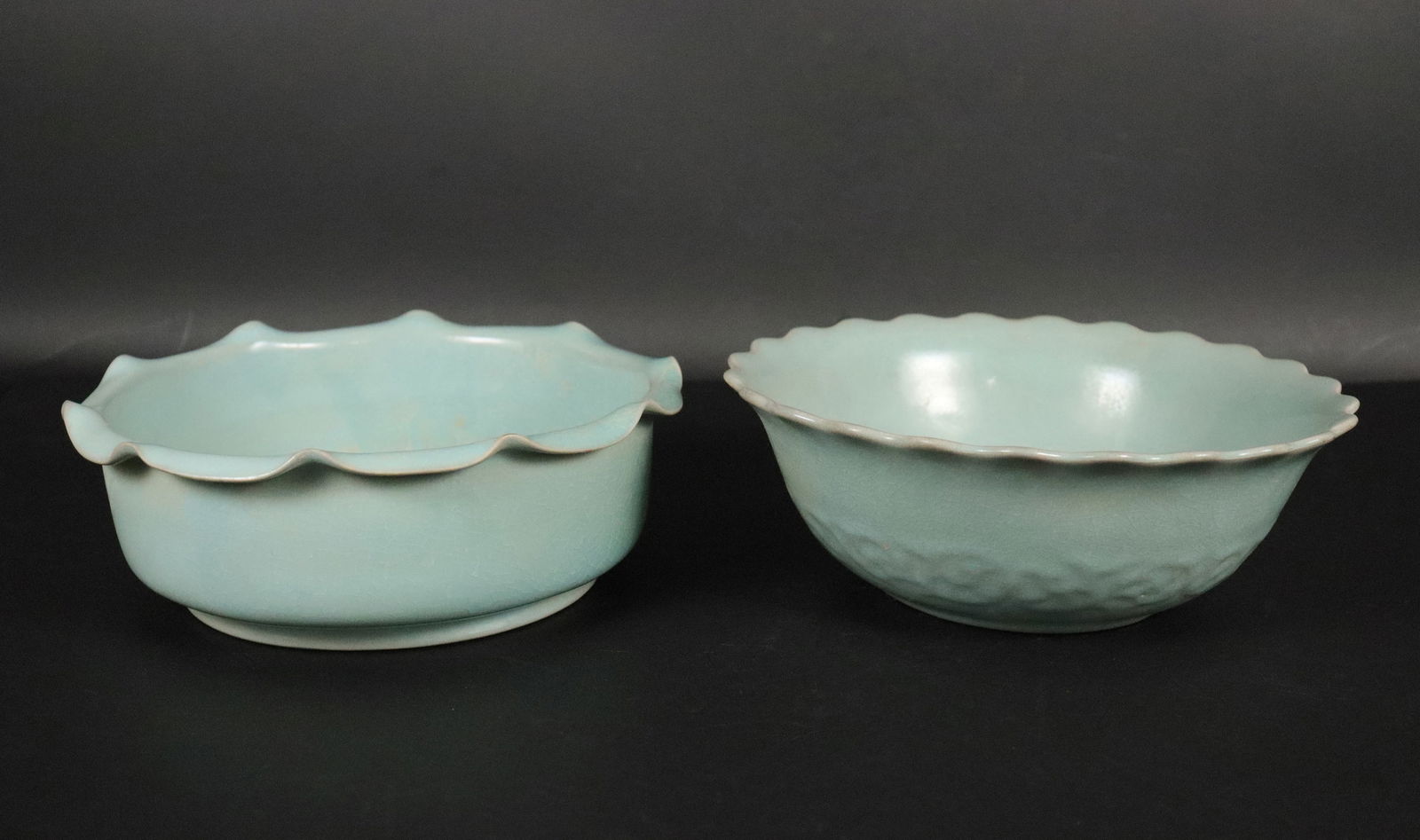 2 Chinese celadon bowls: 2 Chinese fine celadon bowls, with wax seal. H: 2.75" x W: 8."