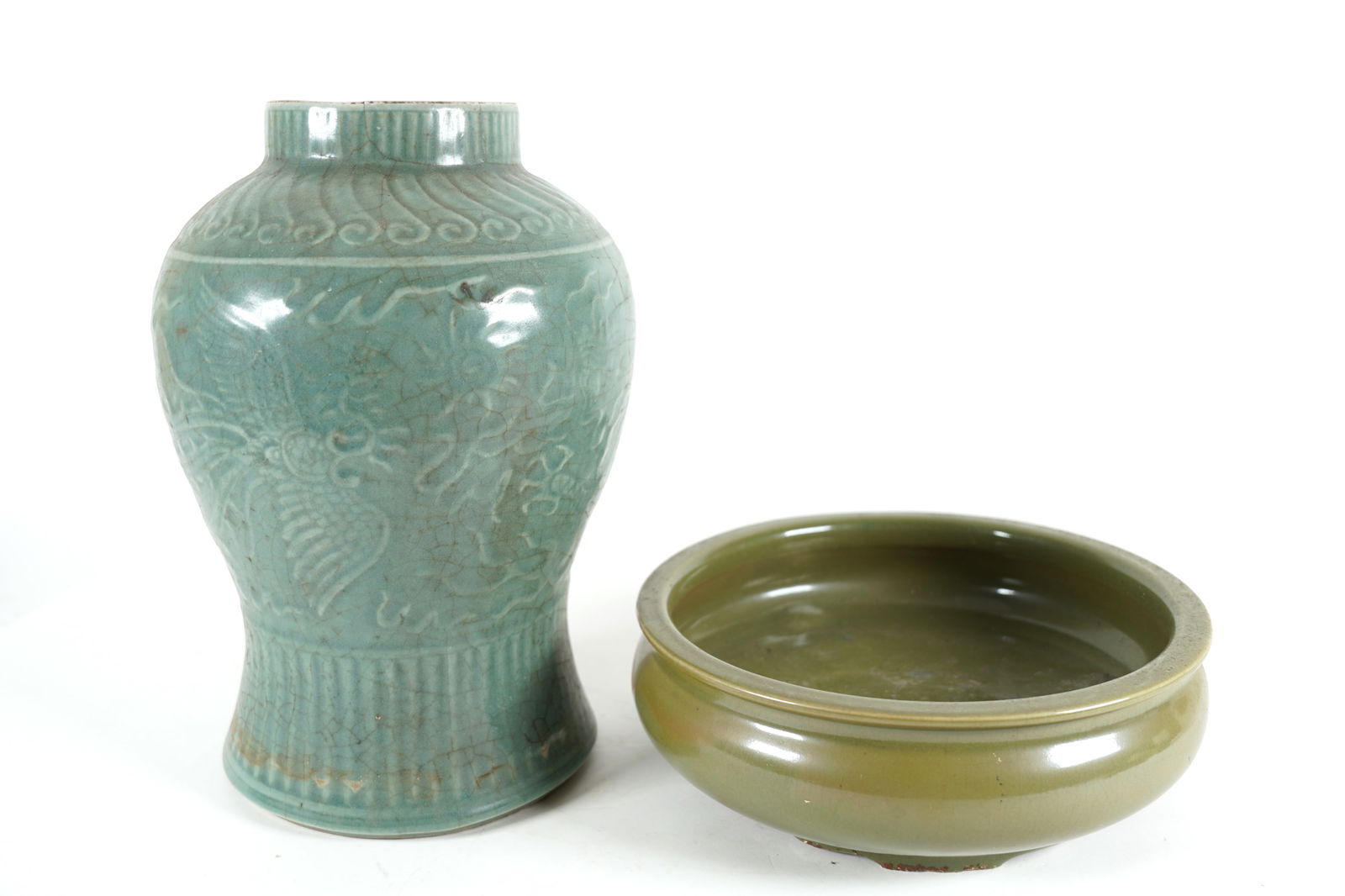 2 Chinese celadon porcelains: 2 Chinese celadon porcelains. Largest H: 12.1" x W: 8."