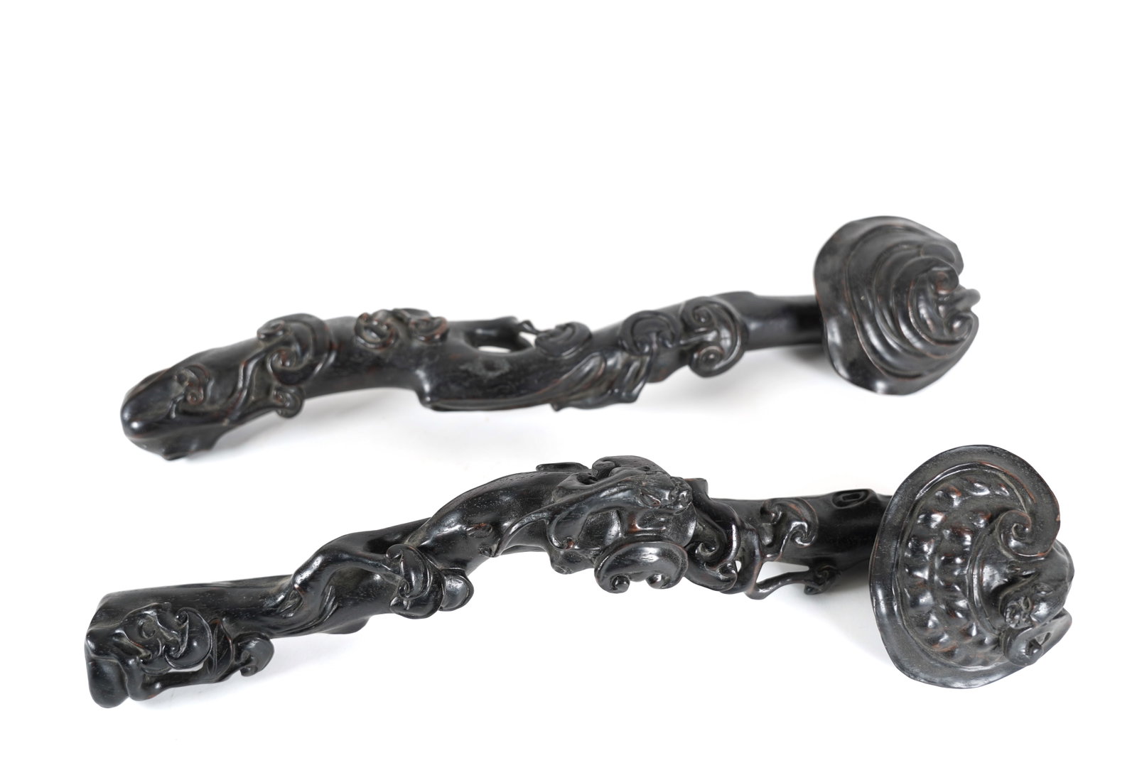 2 Chinese wood scepter: 2 Chinese fine carved wood scepter. H: 4.25" x L: 15.25."