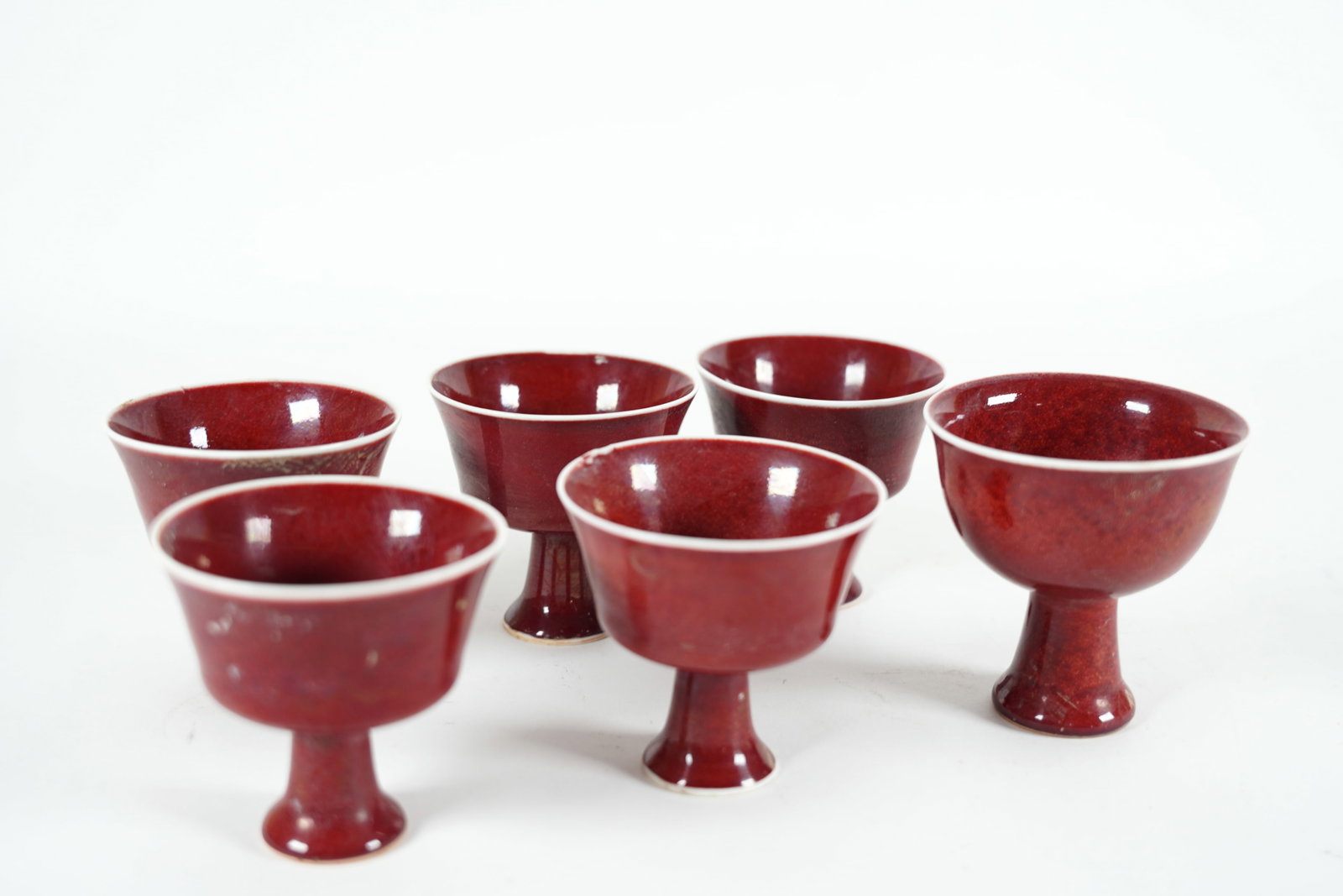 Lots Chinese red cups: Lots Chinese red cups. H: 3.5" x W: 2.9."