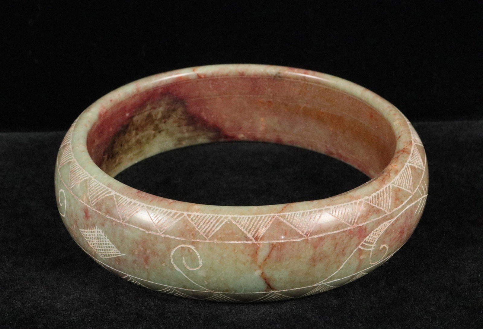 Chinese stone bangles: Chinese fine stone bangles. H: 1.15" x W: 4.25."